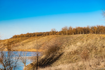 Early spring landscape, in the Rostov region in the city of Shakhty, on the Grushevka river. Sunny...