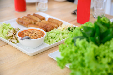 Nam-Neaung of Vietnamese food with roll pork, vegetable and sauce