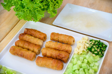 Nam-Neaung of Vietnamese food with roll pork, vegetable and sauce