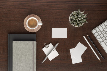 coffee cub notepad notes pen pencil keyboard business car plant  top view with copy space for your text. flat lay. 
