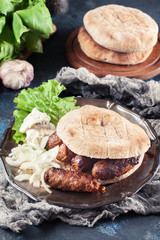 Cevapcici or cevapi served with lepinja bread