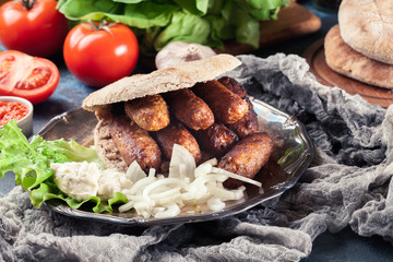 Cevapcici or cevapi served with lepinja bread