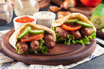 Cevapcici or cevapi served with pita bread