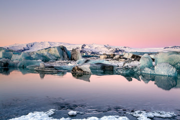 Fototapeta na wymiar Icebergs at sunrise
