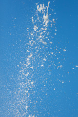 Splashes of water against the blue sky