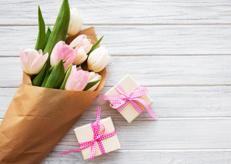 Gift boxes and tulips bouquet