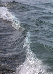 Waves on the seashore as an abstract background