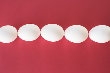Easter eggs on red background.