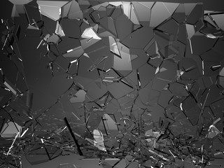 Pieces of glass broken or cracked on black