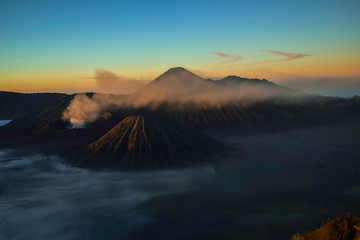 Beautiful colorful sunrise over Mount Bromo and wild island in Mount Bromo National Park