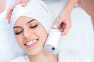 Cosmetology. Apparatus facial massage. Lifting, rejuvenation. Cosmetology clinic.