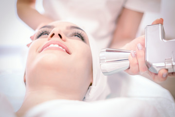 Obraz na płótnie Canvas Cosmetology. Laser procedure on the face. Grinding, rejuvenation.