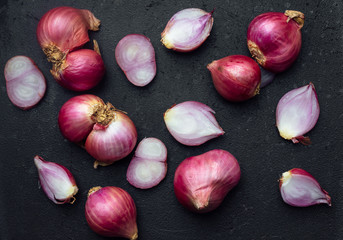 Group of red garlic on black 