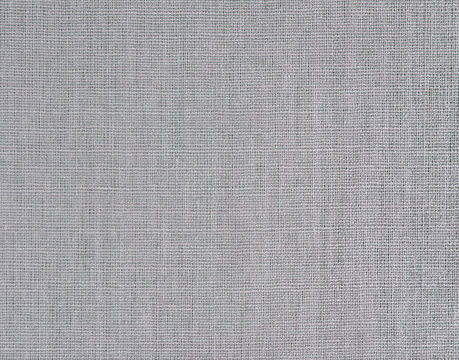 Textured background of gray natural textile    