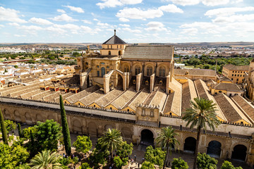 Fototapeta premium View of Mezquita, Catedral de Cordoba, from the Bell tower, the former Minaret of the Moorish mosque. Cordoba, Andalucia, South of Spain. The cathedral is a UNESCO world heritage site.
