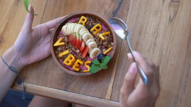 Personalized Bowl in Bali eaten by a young Woman