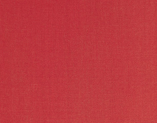 Textured background of red natural textile    