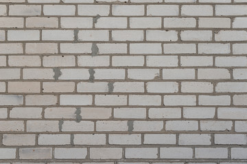 The brick texture, wall, with cracks and scratches