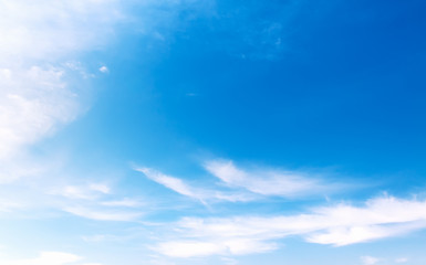 background of blue sky with soft clouds
