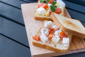 cheese and tomato sandwich, bread, 2 sandwiches