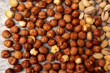 Hazelnut Background. Heap of peeled hazelnuts