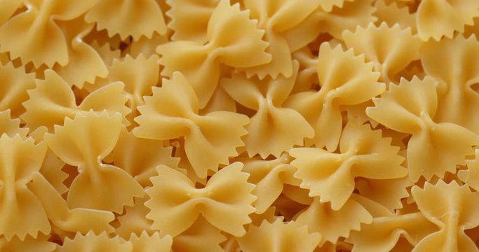 Stack of Dry uncooked farfalle