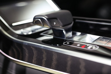 Fototapeta na wymiar Modern shift gear in luxury car interior