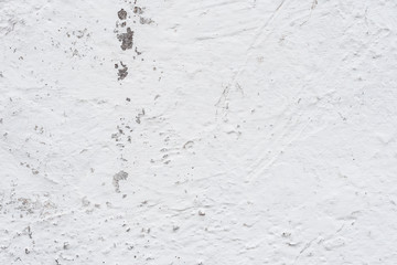 Wall fragment with scratches and cracks