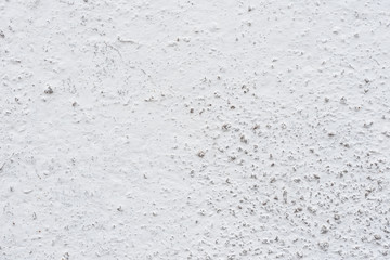 Wall fragment with scratches and cracks