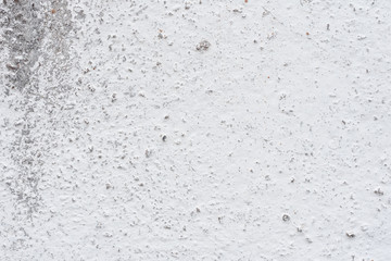Wall fragment with scratches and cracks