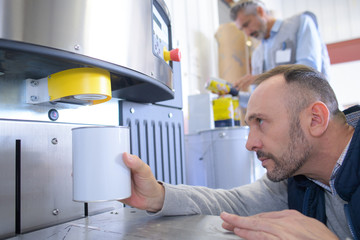 two men in a filtering laboratory © auremar