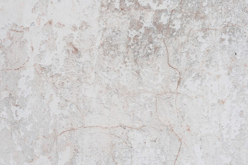 Wall fragment with scratches and cracks