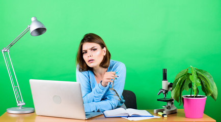 data and information. Business woman. chemist biologist with microscope. woman work in office on...