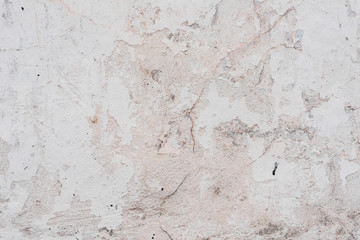 Wall fragment with scratches and cracks