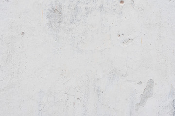 Wall fragment with scratches and cracks