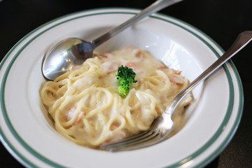 Carbonara Italian pasta or spaghetti white cream sauce.