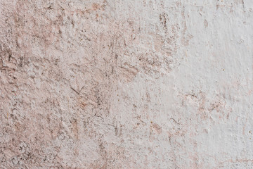 Wall fragment with scratches and cracks