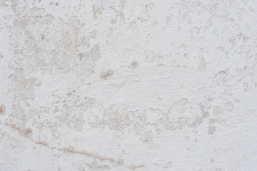 Wall fragment with scratches and cracks