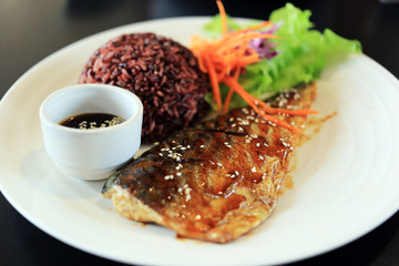 Grilled saba (mackerel) with rice berry and teriyaki dipping sauce. 