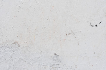 Wall fragment with scratches and cracks