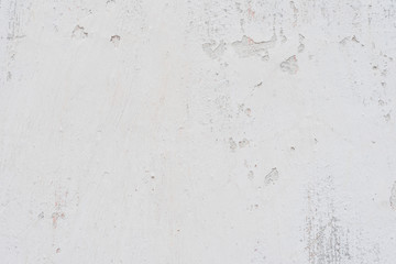 Wall fragment with scratches and cracks