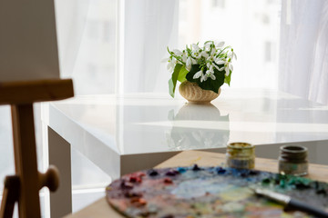 Oil painting snowdrops in a vase