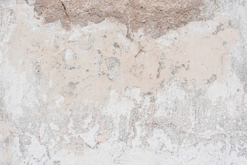 Wall fragment with scratches and cracks