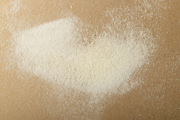 Fototapeta na wymiar Dry gelatine powder and granules used as a gelling agent