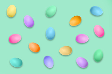 Pastel colored Easter eggs on green background, Easter pattern