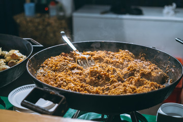 Stewed cabbage in a big frying pan