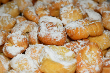 donuts with sugar on plate