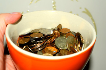 Cup with coins