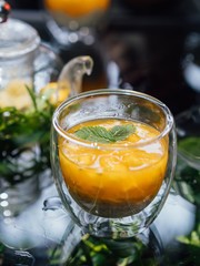 Fresh passion fruit and a glass of passion fruit drink