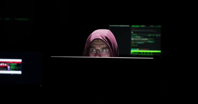 Male hacker in a good working on a hack